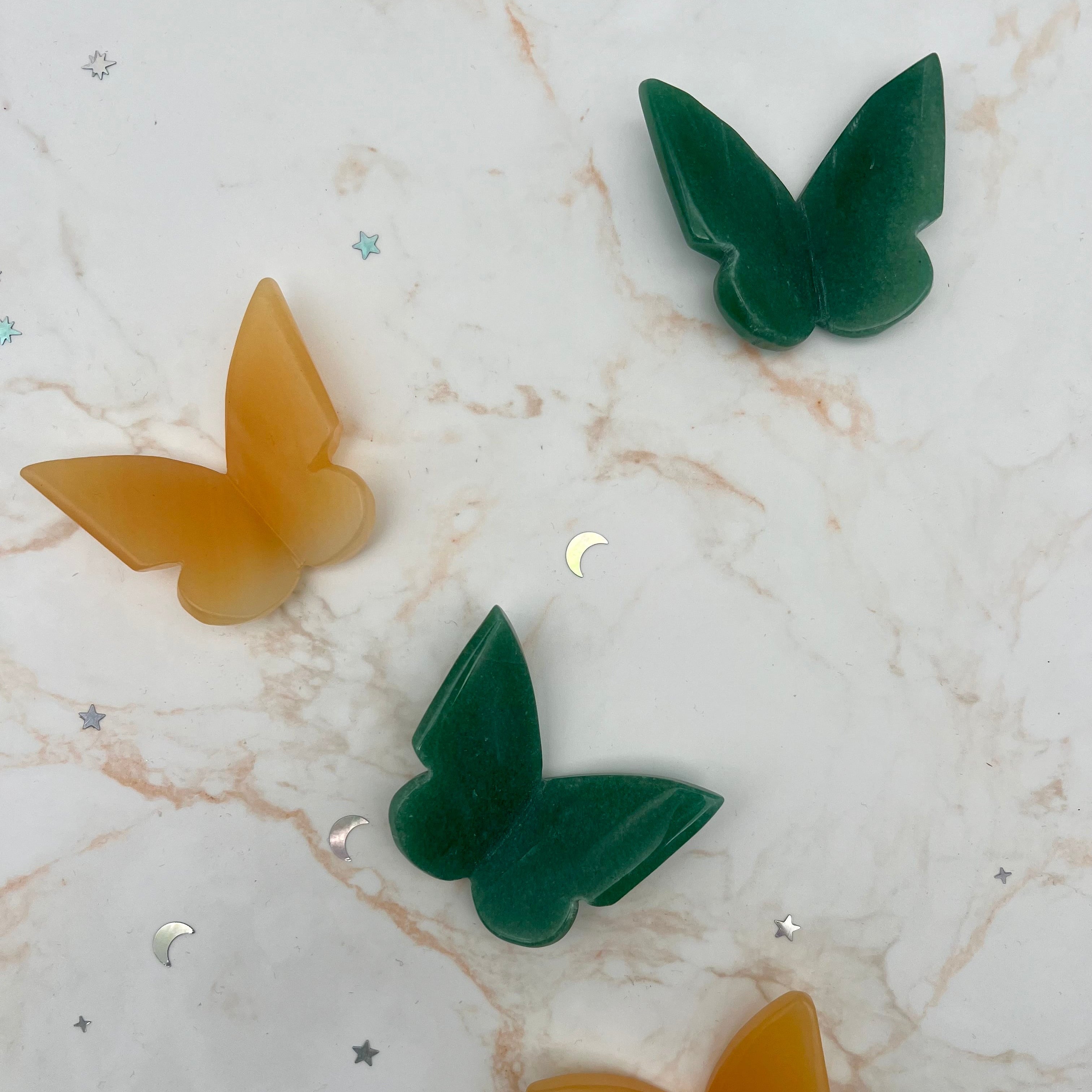 Schmetterling aus Orangencalcit
