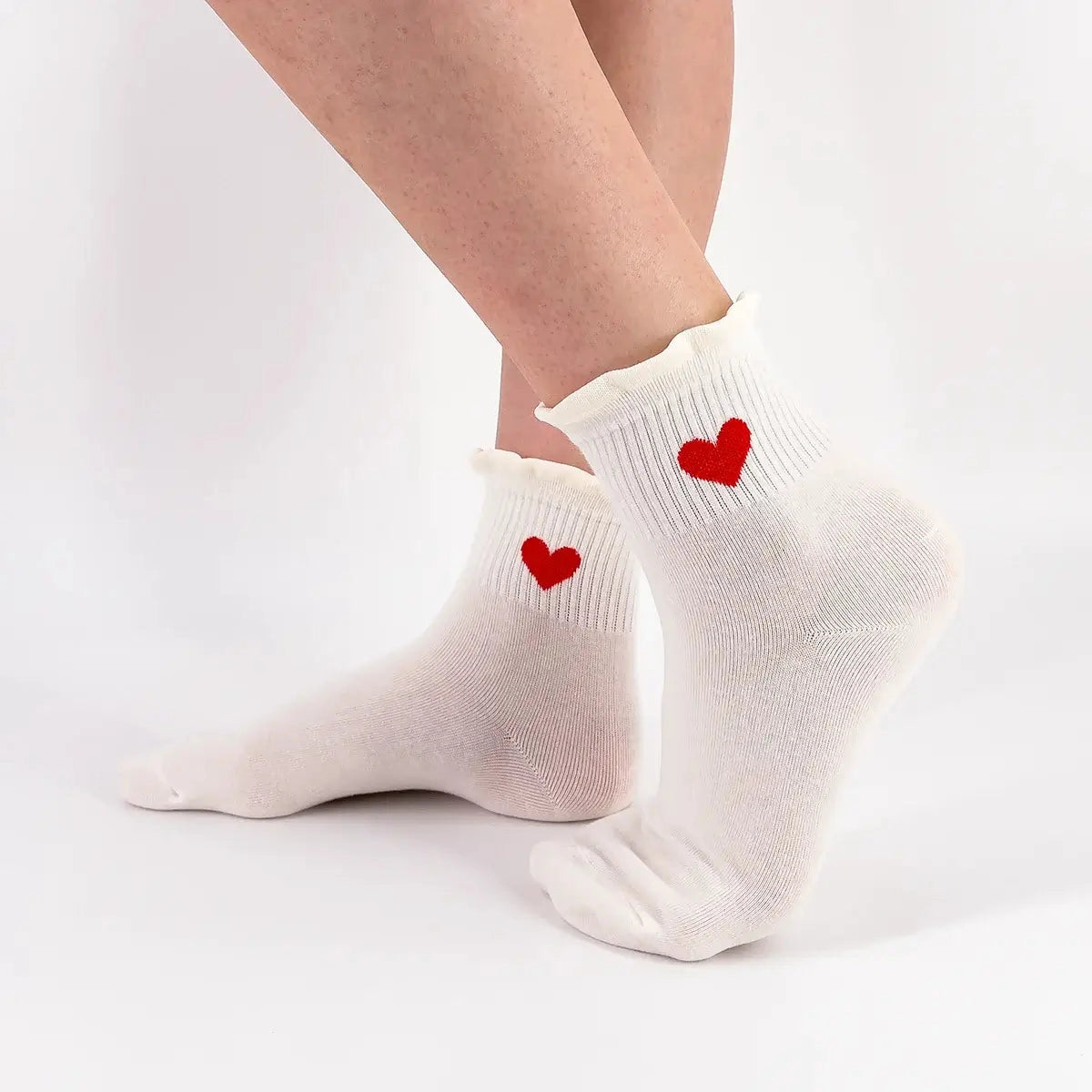 Socken mit Rüschen und Herz